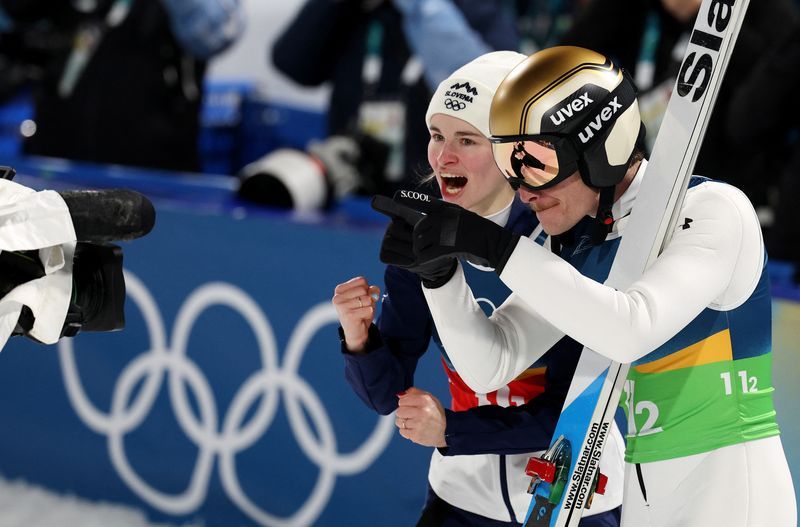 Olympics-Ski Jumping-Prevc siblings lead Slovenia to mixed team gold