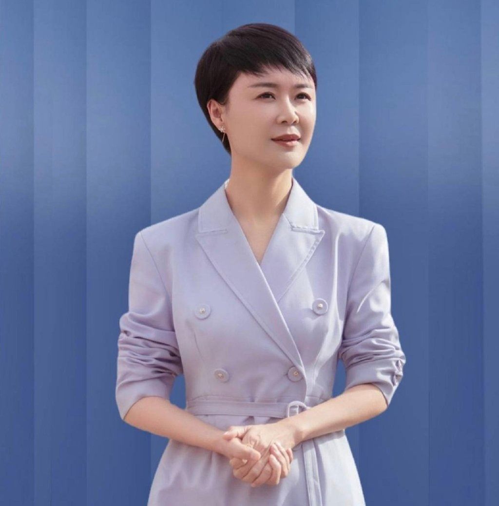 He is pictured here in a suit. She rose to become deputy director of her local Culture and Tourism Bureau before her death. -- Photo: nfnews / SCMP