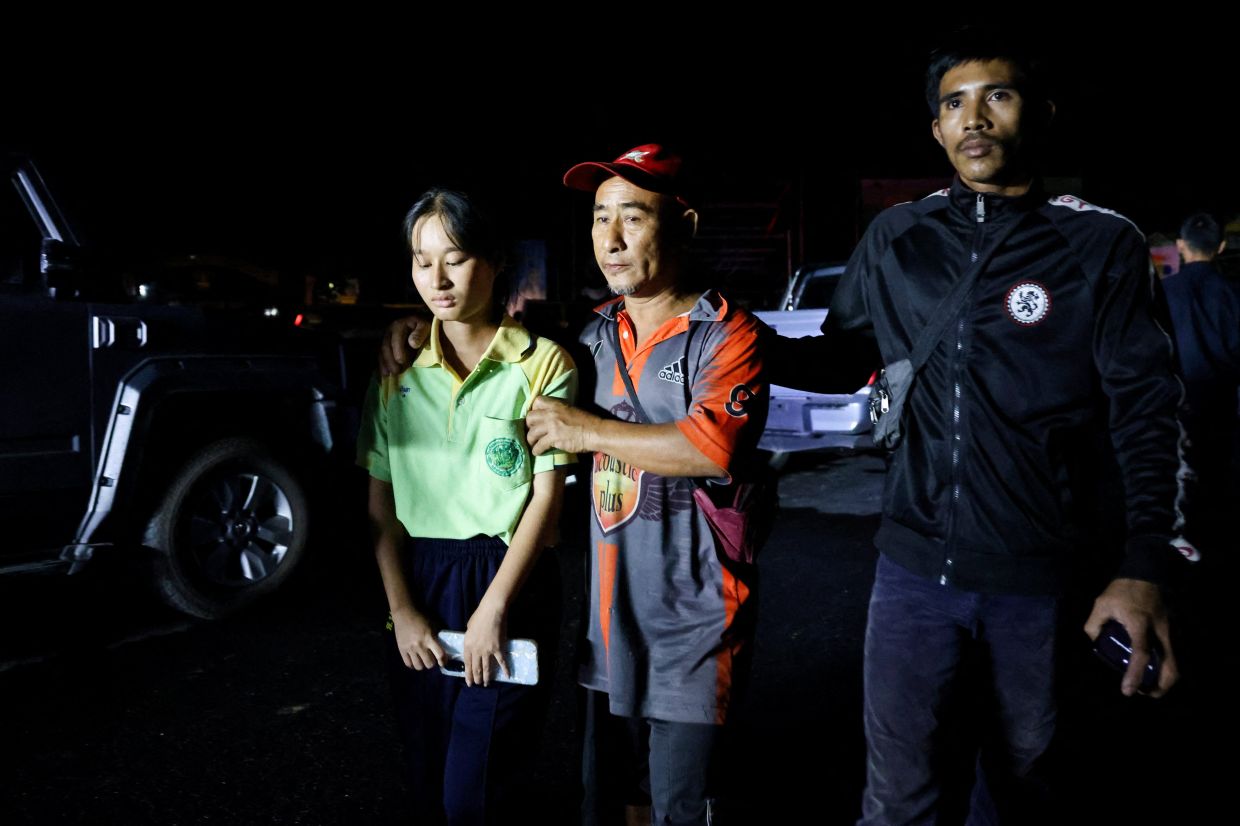 Gunman who entered southern Thai school detained, hostages freed but two wounded