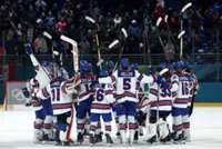 Olympics-Ice hockey-US wallop Canada, Germany beat Italy and Sweden stay perfect