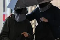 Hong Kong activist's father convicted under national security law over insurance policy