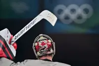 Olympics-Ice hockey-Goalies show pride and personality with artistic helmets