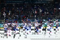 Olympics-Ice hockey-US crush defending champions Canada 5-0 in group stage