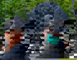 Trainee doctor accused of filming a woman bathing claims trial