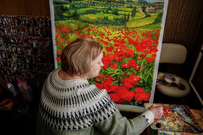 Olympics 'look surreal' from Ukraine, artist behind war dead helmet says