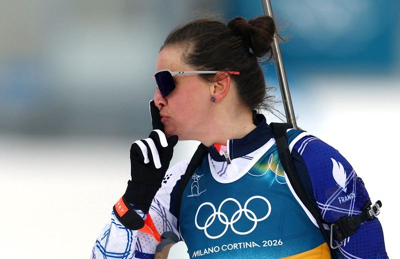 Olympics-Biathlon-Simon shushes media critic after another golden win