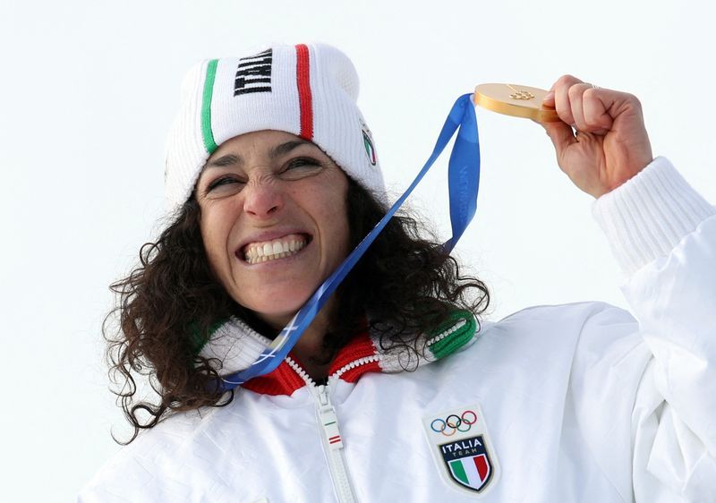 Olympics-Alpine skiing-Willpower drove Brignone to gold after injury, Italy's team doctor says