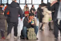 Travellers brace crowds, long journeys to see loved ones