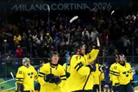 Olympics-Ice hockey-Sweden overcome surprise Italy fight, Slovakia stun defending champs Finland