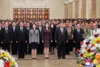 North Korea's Kim positioning daughter as successor, Seoul spy agency briefing says