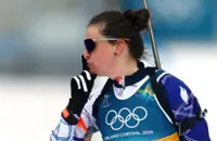 Olympics-Biathlon-Simon shushes media critic after another golden win