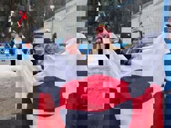 Olympics-Biathlon-Greenland's athletes show Trump the world stands with us, minister says