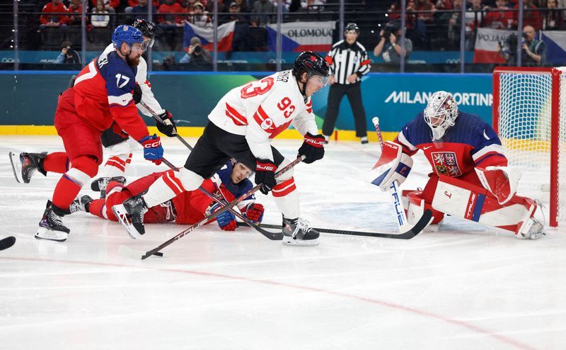 Olympics-Ice hockey-Masterful Canada shut out Czechs, US work out early kinks v Latvia