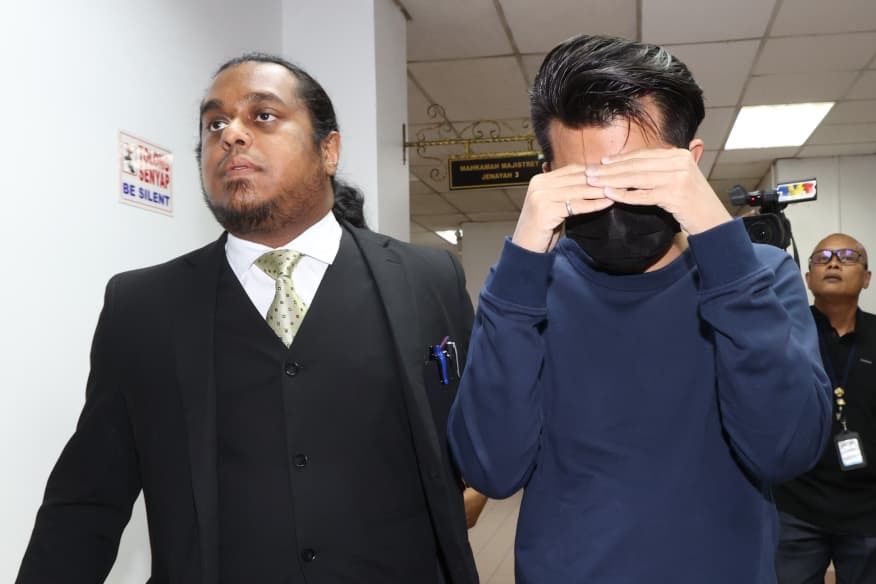 Former e-hailing driver claims trial to outraging passenger's modesty