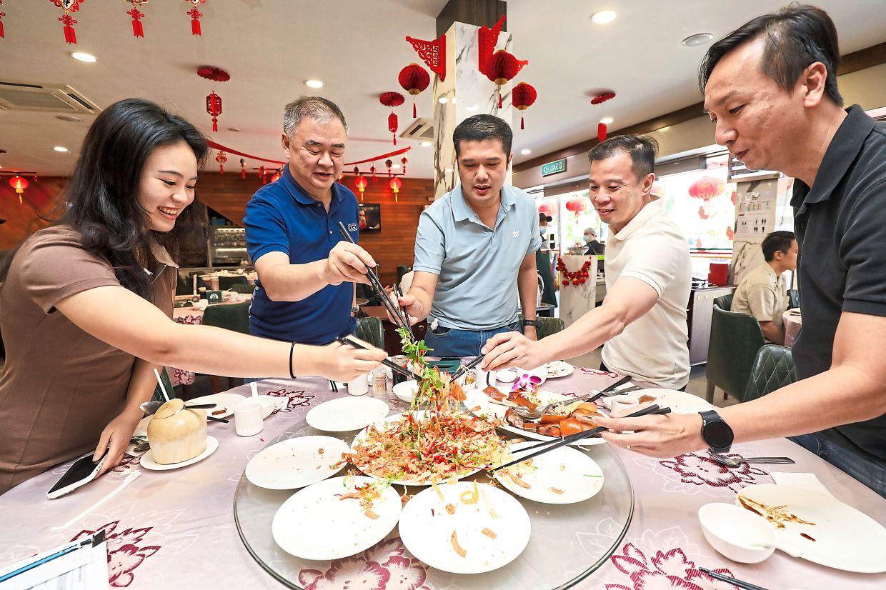 Yee sang is culturally significant during CNY in Malaysia and is thought to have been created in Seremban in the 1940s. — LEONG WAI YEE/The Star