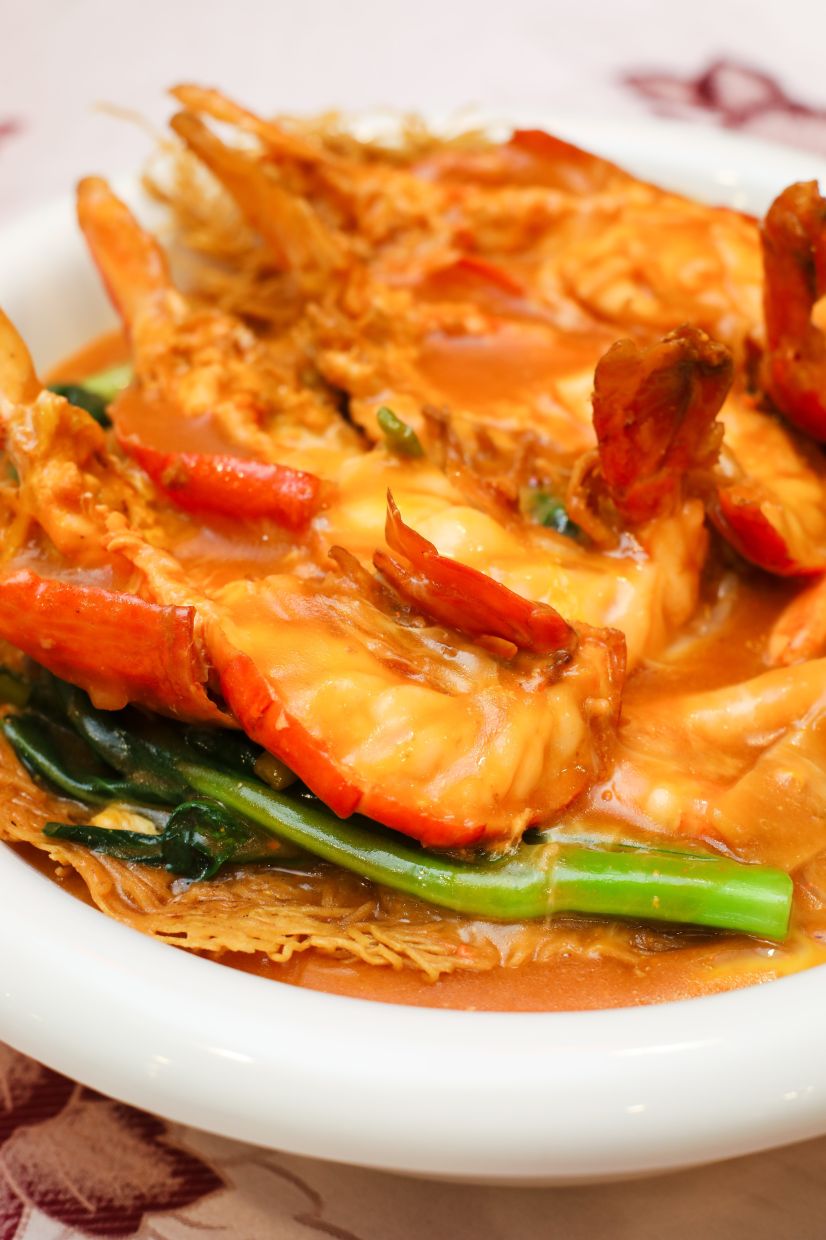 Sang har mee is essentially noodles layered with a thick gravy enhanced by giant roe-filled Malaysian freshwater prawns. — LEONG WAI YEE/The Star