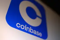 Cryptocurrency exchange Coinbase's swings to quarterly loss on trading slowdown