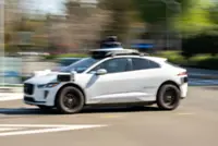 Waymo tries finding DoorDash drivers to shut open robotaxi doors