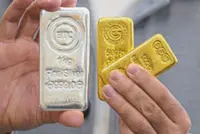 Gold bounces back from near one-week low; US inflation data in focus