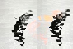 Olympics-Figure skating-Malinin making history with skating's first Olympic backflip in decades