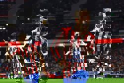 Soccer-Atletico hit Barcelona for four to take giant step toward Copa del Rey final