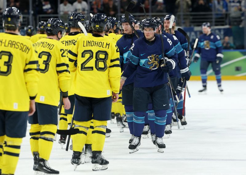 Olympics-Ice hockey-Finland rise to the occasion in new chapter to Swedish rivalry