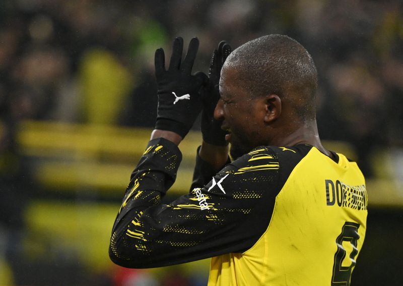 Soccer-Guirassy bags brace as Dortmund top Mainz 4-0 to keep pressure on leaders Bayern