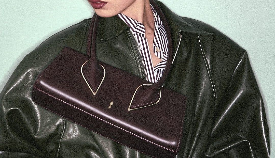 A style compass pointing east-west: Fashion's obsession with elongated bags
