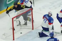 Olympics-Ice hockey-Sweden hold off Slovakia, Latvia beat Germany
