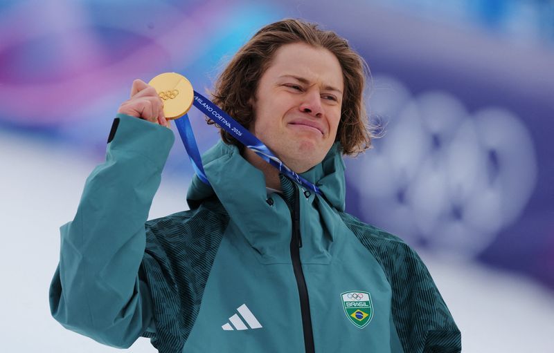 Olympics-Alpine skiing-From soccer dreamer to snow king, Brazil's Pinheiro Braathen strikes gold