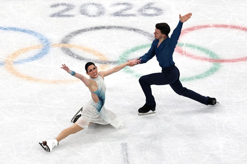Olympics-Figure skating-Italy's ice dance couple savour Valentine's Day at home Games