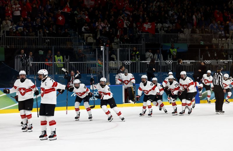 Olympics-Ice hockey-Switzerland into semis after Muller goal downs Finland