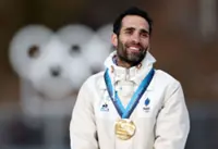 Olympics-Biathlon-Sixteen years on, Fourcade finally tastes sweet Vancouver gold