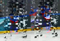 Olympics-Ice hockey-Slovakia celebrate 'best loss' as they reach quarter-finals