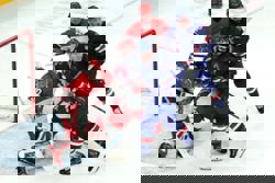 Olympics-Ice hockey-US men subdue Denmark for second win