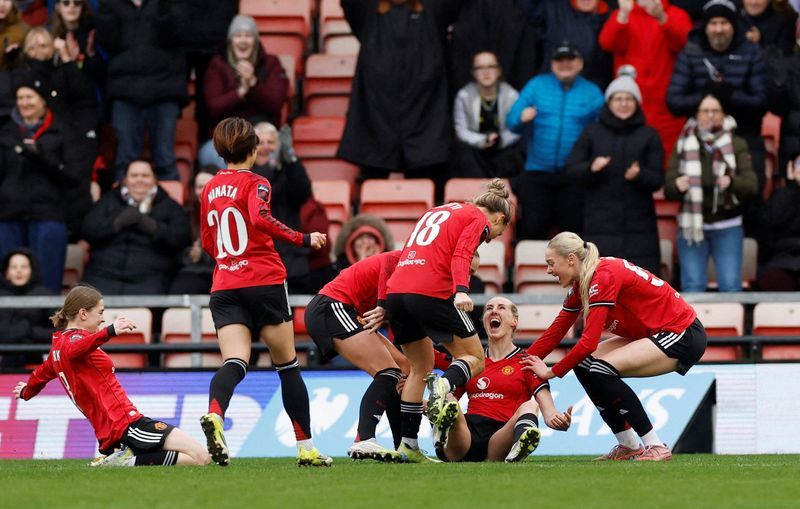 Soccer-Man United beat London City, Man City stay top of WSL