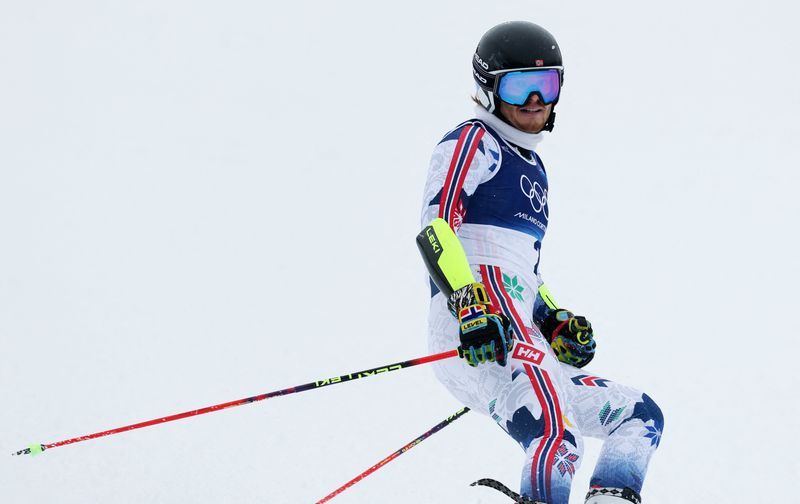 Olympics-Alpine skiing-Norway's McGrath leads men's slalom, Pinheiro Braathen out