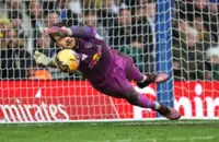 Soccer-Leeds beat Birmingham on penalties in Cup, Wolves survive Grimsby mud bath