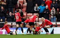 Soccer-Man United beat London City, Man City stay top of WSL