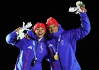 Olympics-Britain celebrates 'Slippery Sunday' double gold