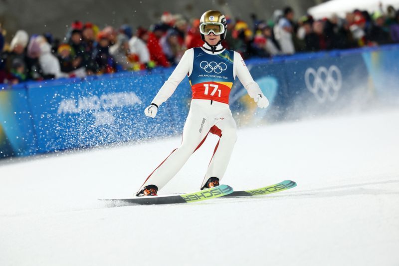 Olympics-Ski jumping-Austria prevail in chaotic super team final disrupted by snow