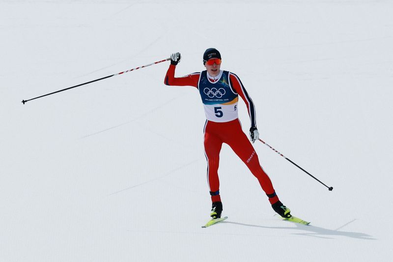 Olympics-Nordic combined-Norway's Oftebro powers to gold with late surge in men's large hill