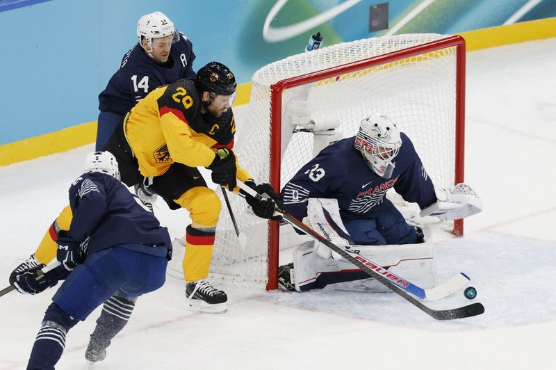Olympics-Ice hockey-Germany beat France to reach quarter-finals