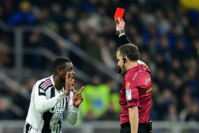 Soccer-Juve executives banned after clash with referee in wake of Kalulu dismissal