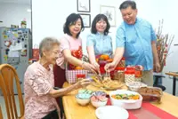 Couple celebrate full circle return to birth year with kin