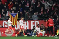 Soccer-Barcelona stunned by Girona 2-1 to leave Real Madrid top of LaLiga
