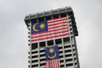 Malaysia drops defamation case against Australian in Thailand