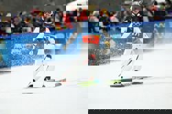 Olympics-Ski jumping-Austria win men's super team gold