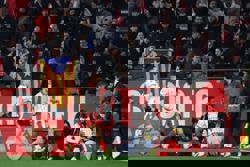 Soccer-Girona stun Barcelona 2-1 to leave Real Madrid top of LaLiga