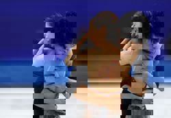 Olympics-Figure Skating-Japan's Kihara says he skated through tears to claim Olympic pairs gold